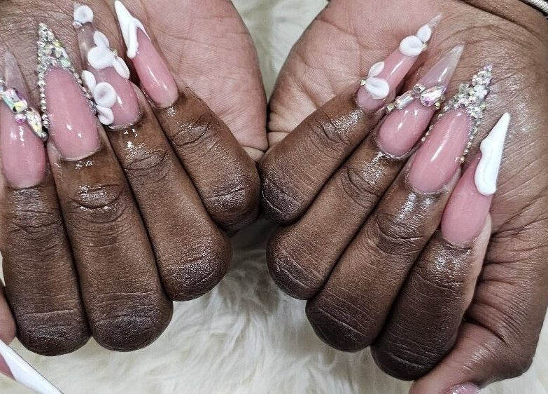 Intricate nail art at Object of Beauty Studio, Saint James, BB. Elegant and detailed design.