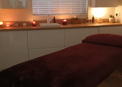 Cozy massage room with candles at Velvet Lily Massage, Dunfermline, Scotland, GB.