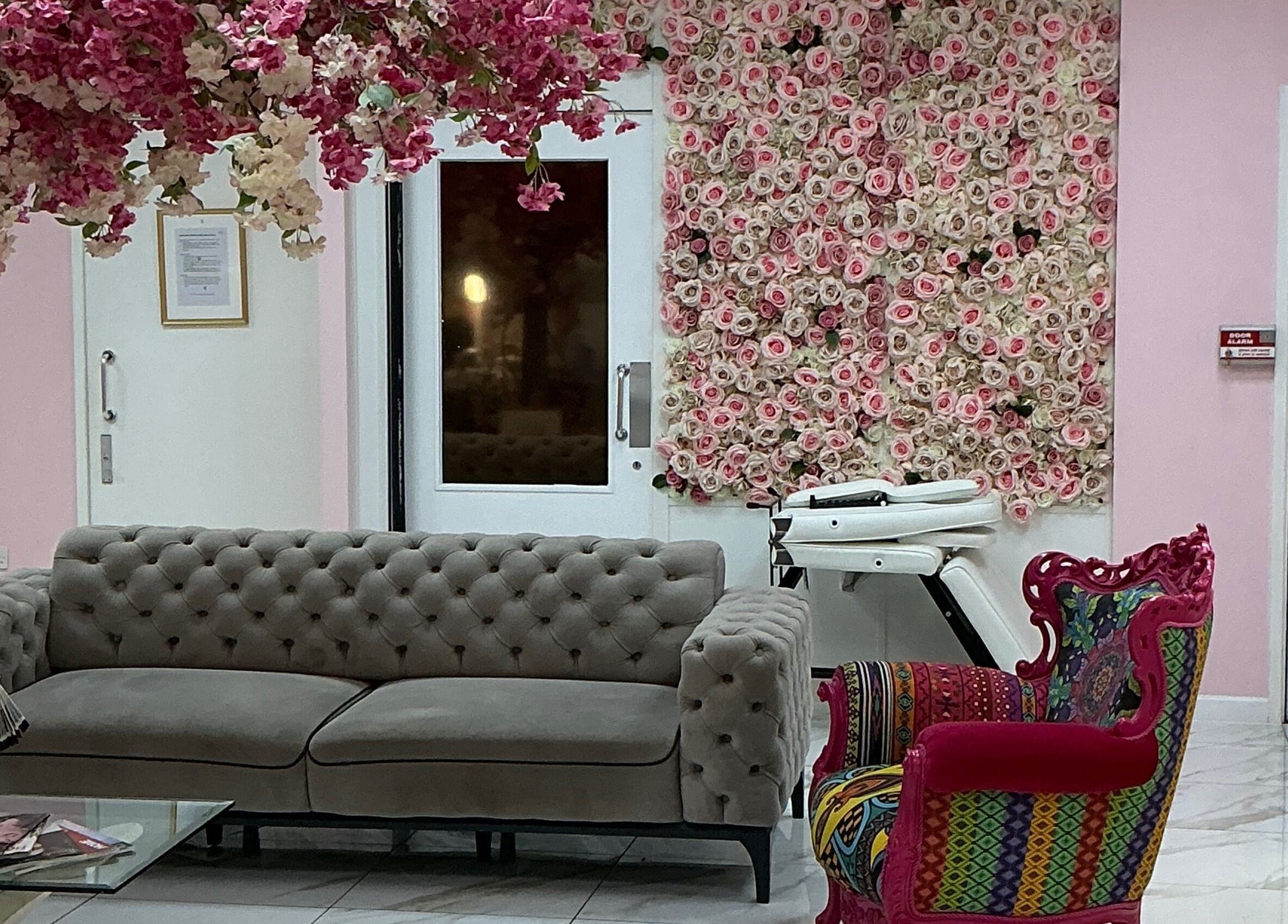 Chic lounge with floral decor at InWonderland Lakeside, Grays, England, GB. Perfect for beauty and wellness relaxation.