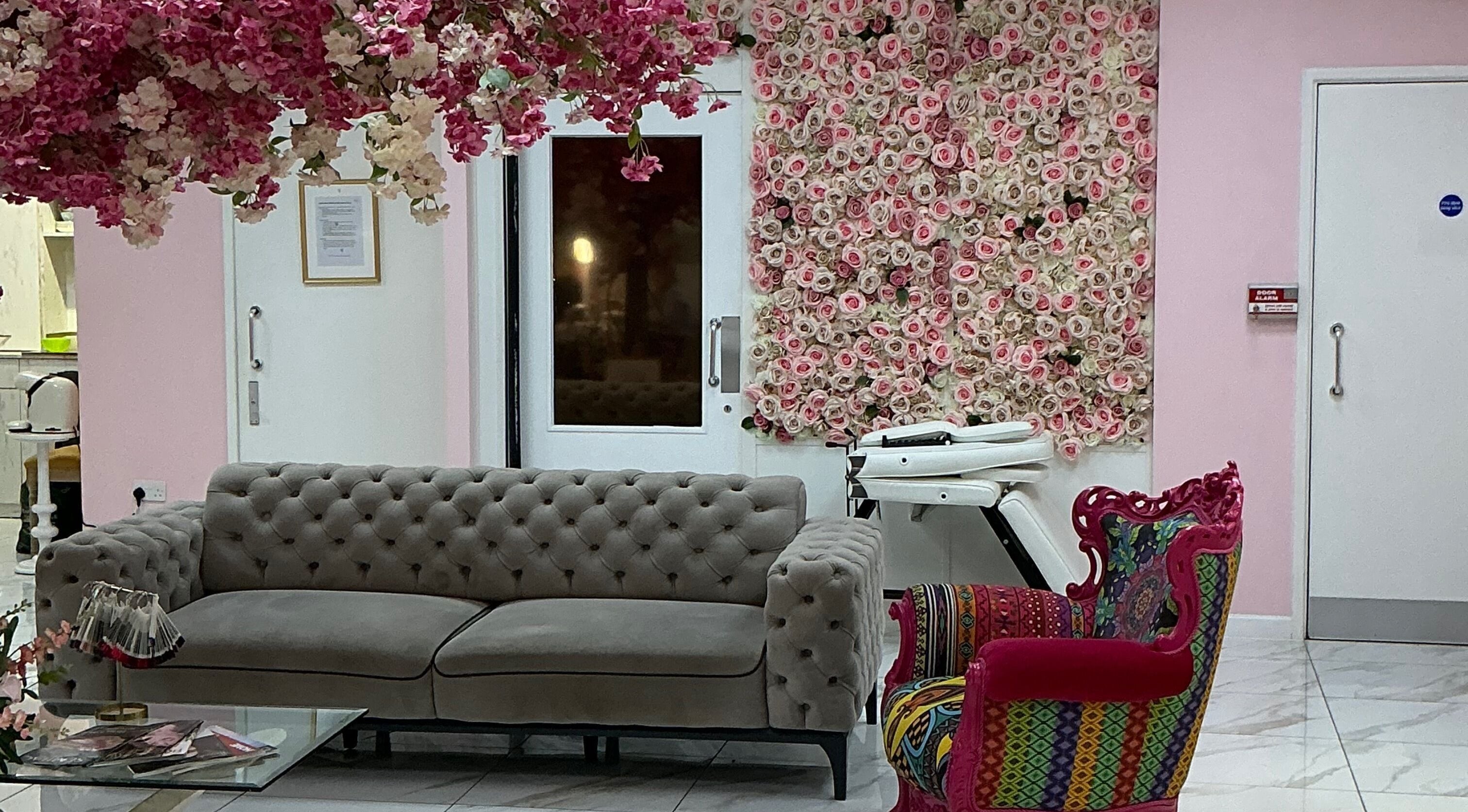 Chic lounge with floral decor at InWonderland Lakeside, Grays, England, GB. Perfect for beauty and wellness relaxation.