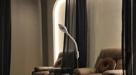 Relaxing chairs at Tiptoe Nailounge, Sharjah, AE, offering a tranquil spa experience.