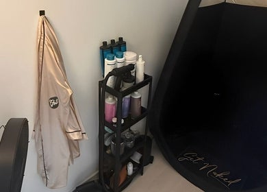 Cozy corner at Hey Girl Beauty and Aesthetics, Birkenhead, England, GB with tanning essentials.