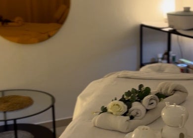 Cozy massage room at Ad Astra massage, Trimbach, Solothurn, CH, with elegant decor and plush towels.