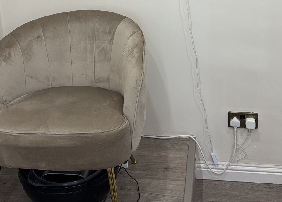 Elegant chair in modern decor at RMC Beauty, West Calder, Scotland, GB. Perfect for relaxation and style.