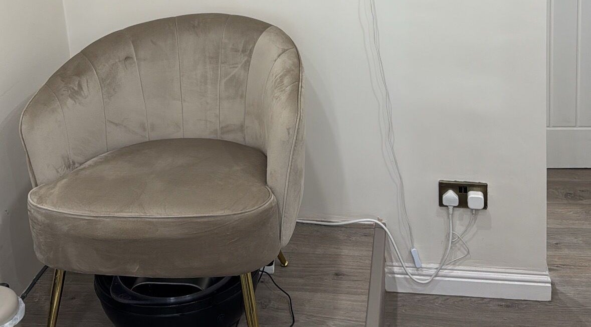 Elegant chair in modern decor at RMC Beauty, West Calder, Scotland, GB. Perfect for relaxation and style.