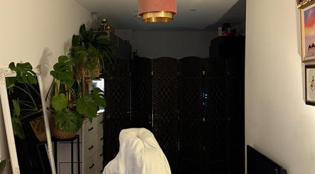Relaxed corner with lush plants at Bloom & Ouud, Birmingham, England, GB.