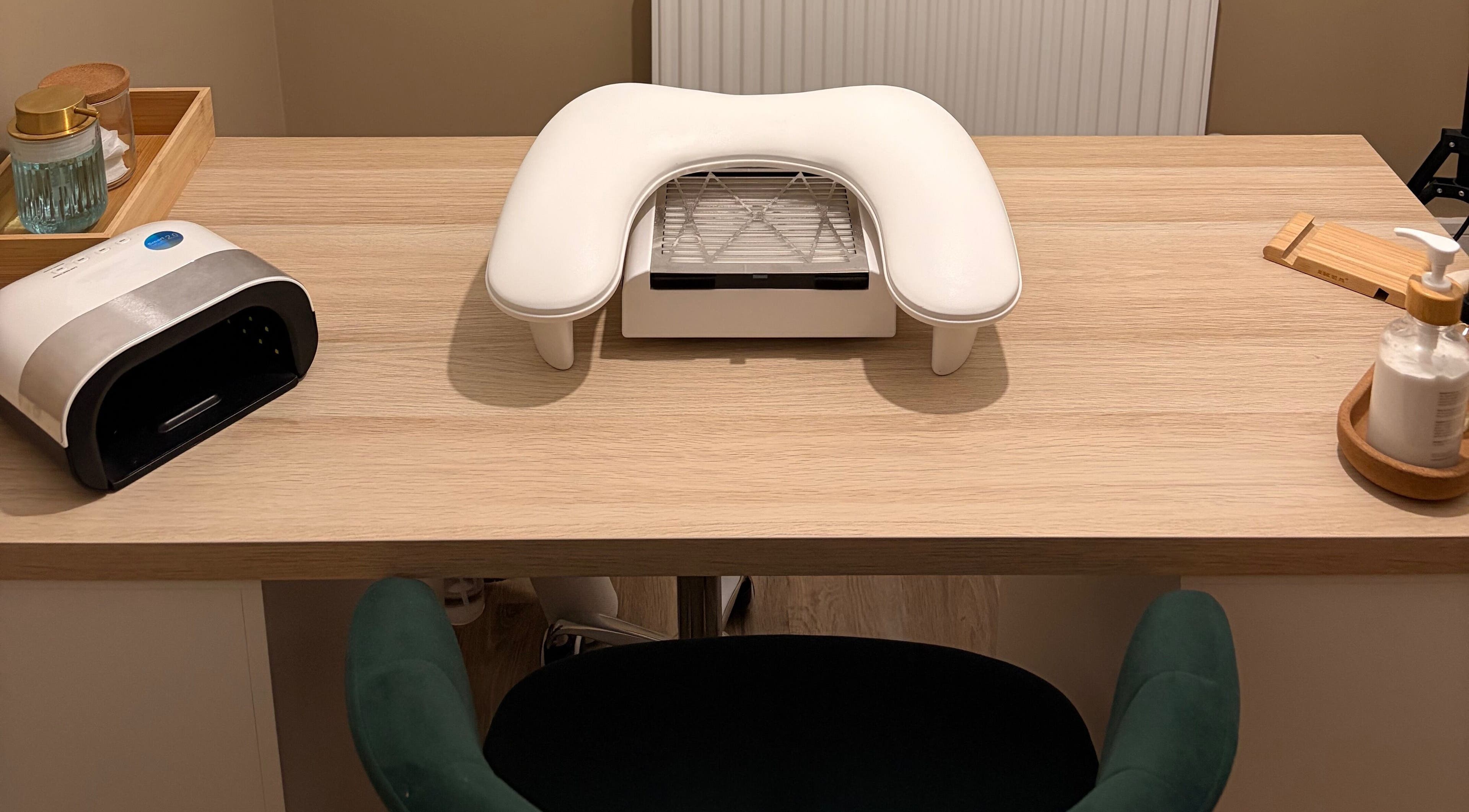 DLBeauty nail station in Branston, England, GB featuring manicure tools on a wooden desk.