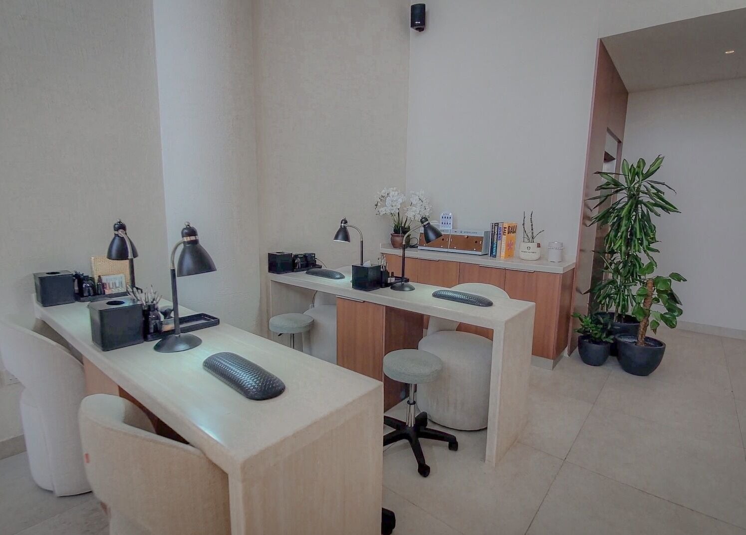 Modern nail station at Women Address, Riyadh, Riyadh Province, SA, featuring sleek design and comfortable seating.