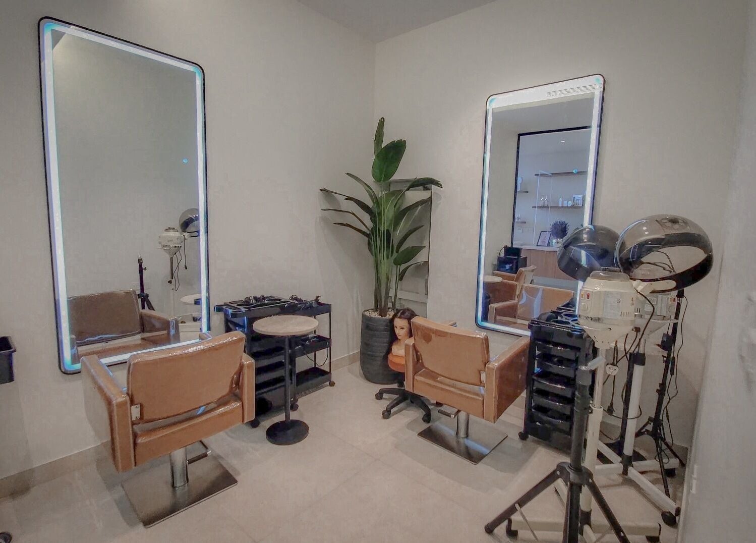 Modern salon styling chairs and mirrors at Women Address, Riyadh, Riyadh Province, SA.