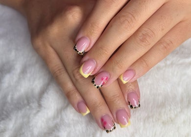 Elegant nail art with pink and leopard tips by Byabbyrae in Hyde, England, GB.