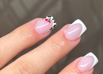 Chic nail art at Byabbyrae, Hyde, England, GB featuring white tips and cherry design.