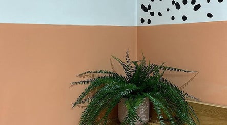 Elegant fern decor at Alex Massage Therapies, enhancing relaxation ambiance in Bristol, England, GB.
