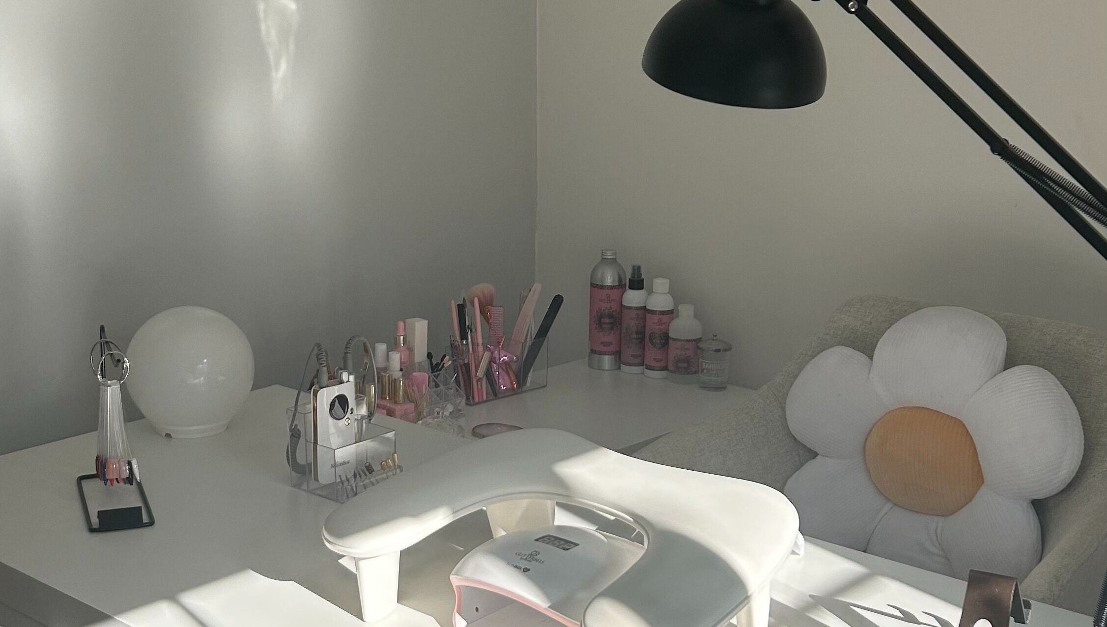 Elegant nail station at Nails by Daisy, Doncaster, England, GB featuring stylish tools and floral decor.