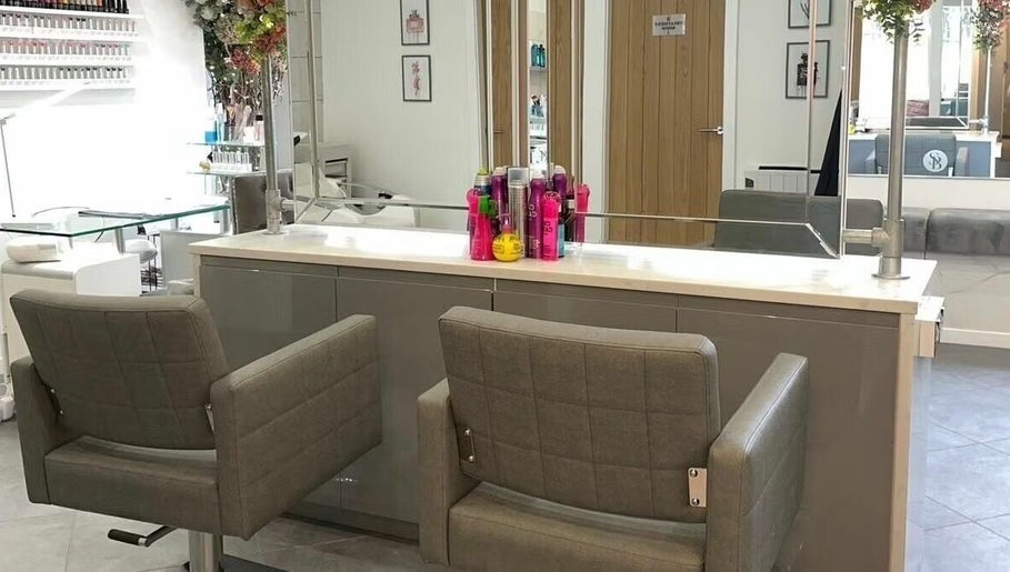 Interior of Helen Seaton Hairdressing in Liverpool, England, GB showcasing modern salon chairs and styling area.