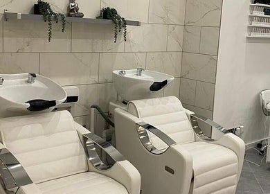 Sleek salon wash stations at Helen Seaton Hairdressing in Liverpool, England, GB offer a premium haircare experience.