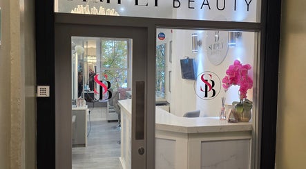 Entrance to Simply Beauty salon with bright interior visible, Liverpool, England, GB near Helen Seaton Hairdressing.