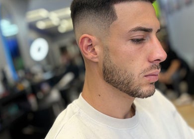 Close-up of a sharp fade haircut at Nilson|Barbeiro, Dublin, County Dublin, IE, showcasing precision barbering.
