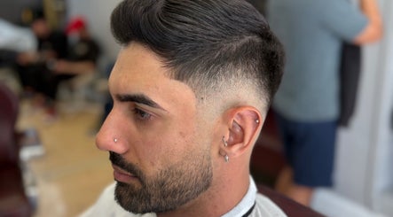 Close-up of a sleek fade haircut at Nilson|Barbeiro, Dublin, County Dublin, IE, showcasing professional grooming.