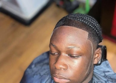 Close-up of braided hairstyle at Barba_bwoy, Linden, Upper Demerara-Berbice, GY.