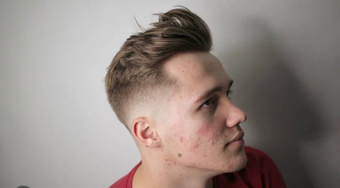 Trendy fade haircut at Tamus, Dublin, County Dublin, IE. Perfect blend of style and precision.