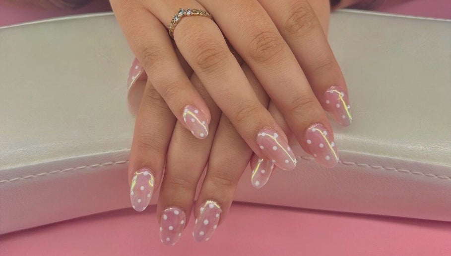 Elegant pink polka dot manicure at Khrome Nail Studio, St. John's, Newfoundland And Labrador, CA.