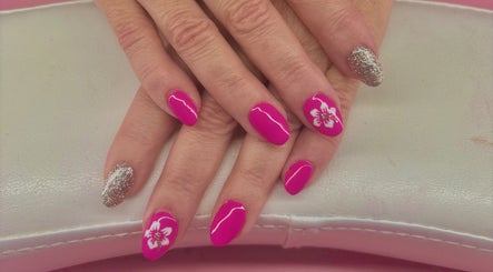 Elegant floral and glitter pink nails by Khrome Nail Studio in St. John's, Newfoundland And Labrador, CA.