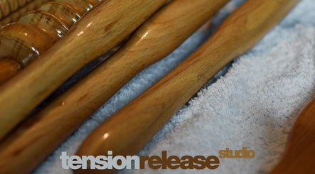 Wooden massage tools on a towel at Tension Release Studio, Vancouver, British Columbia, CA.