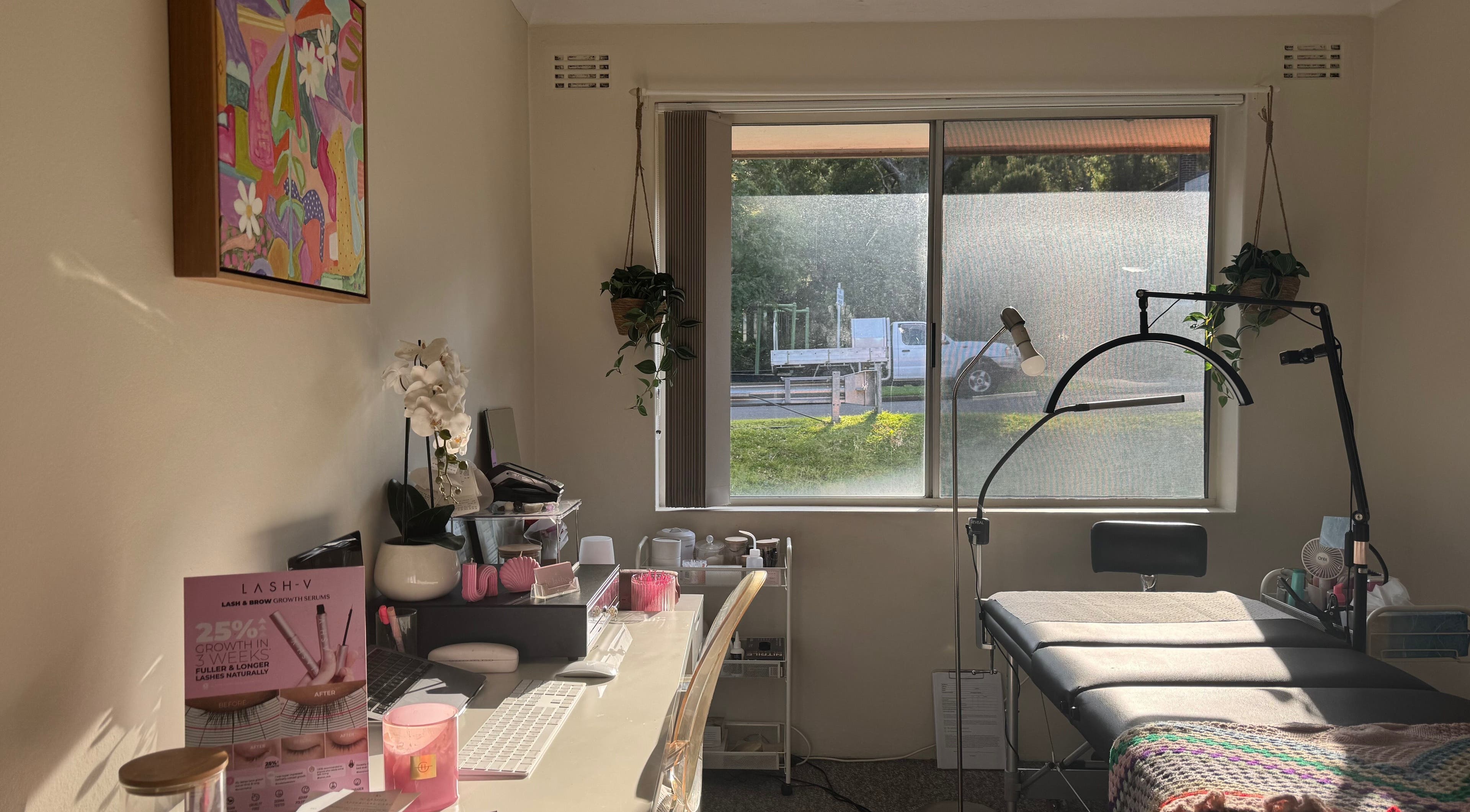 Cozy treatment room at IC Lashes, Balgownie, New South Wales, AU with modern decor and natural light.