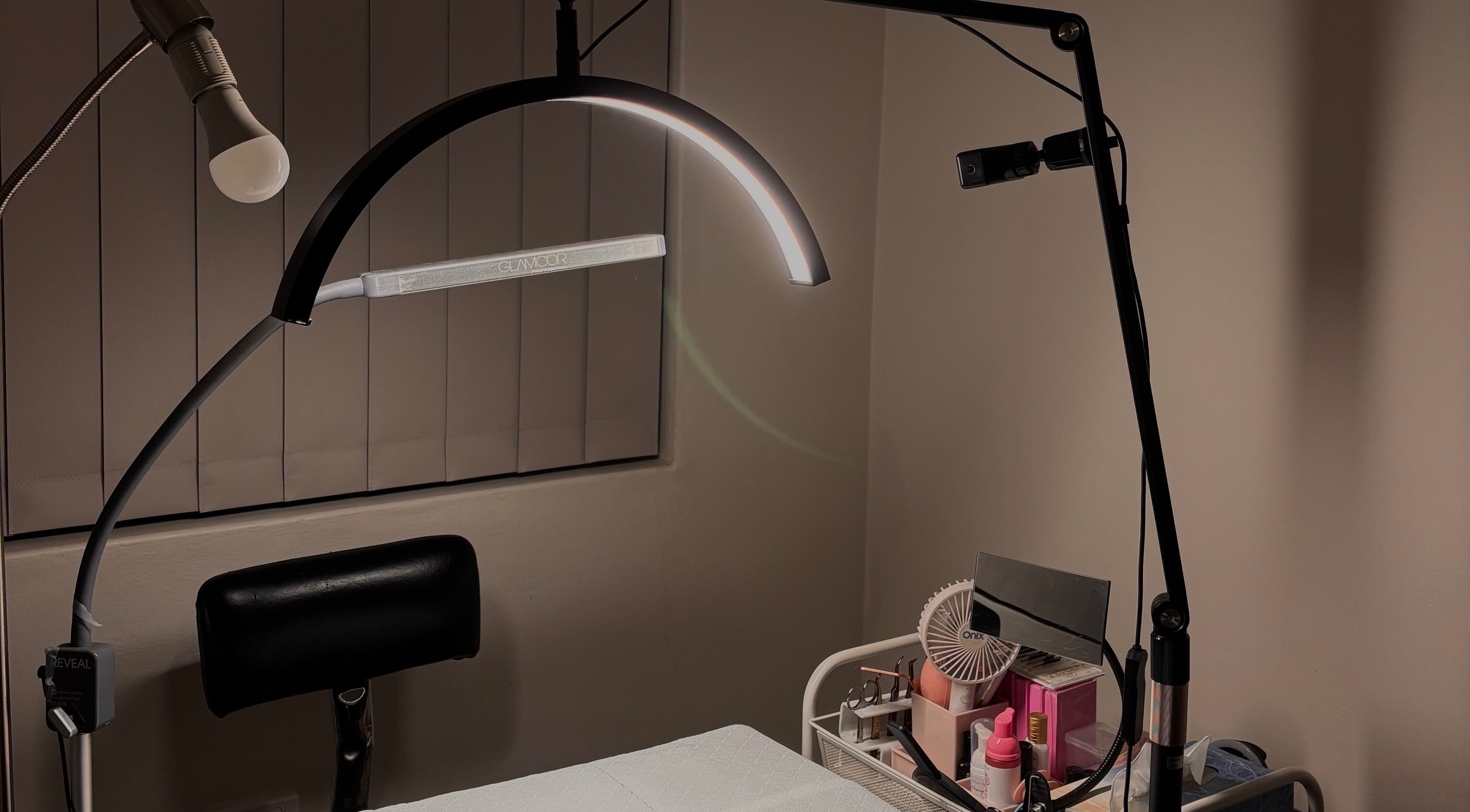 Professional lash setup at IC Lashes, Balgownie, New South Wales, AU, showcasing tools and ambient lighting.