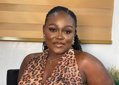 Sophisticated woman at Pwencex Empire, Kingswinford, England, GB, showcasing chic style and elegance.