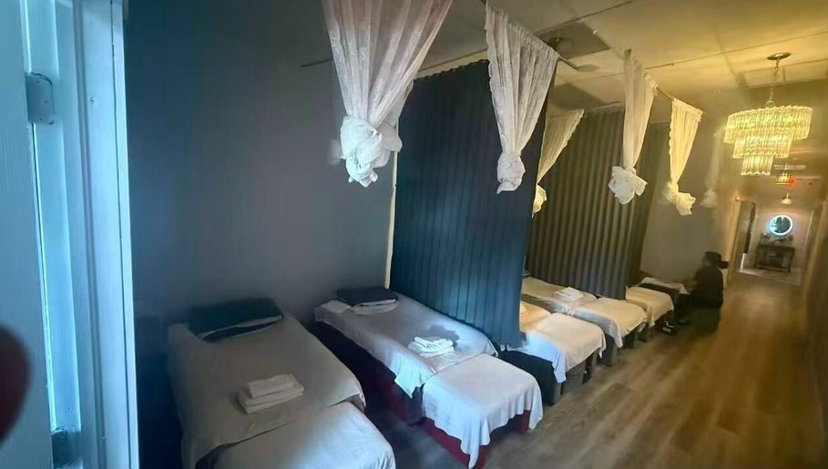 Tranquil massage beds at Chi Foot Spa in Pembroke Pines, Florida, US, showcasing a serene wellness setting.