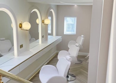 Elegant beauty chairs and mirrors at By Élize, Plymouth, England, GB, enhancing wellness and style.