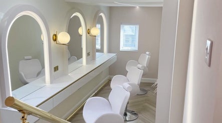 Elegant beauty chairs and mirrors at By Élize, Plymouth, England, GB, enhancing wellness and style.