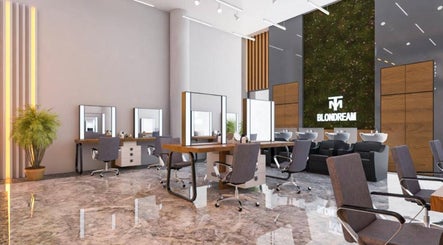 Modern salon interior at The Most Dubai, دبي, دبي, AE with stylish chairs and mirrors, creating an inviting ambience.