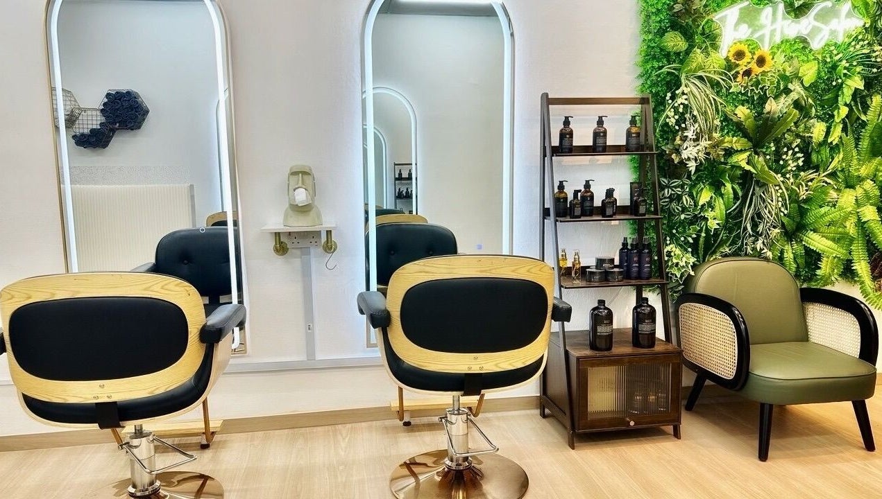 Modern salon interior with lush greenery at The Hive Salon, Singapore, Singapore, SG.