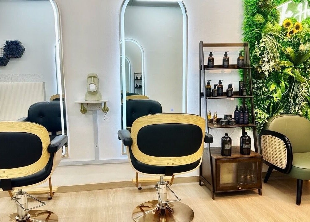 Modern salon interior with lush greenery at The Hive Salon, Singapore, Singapore, SG.
