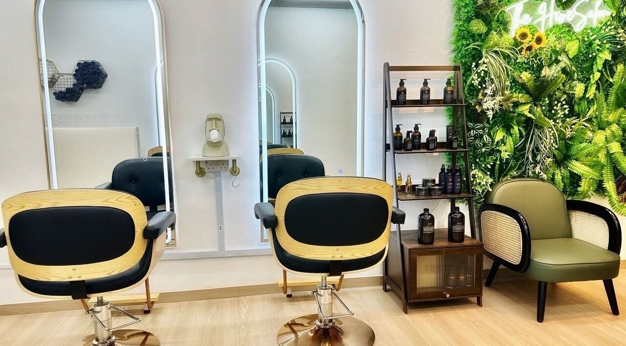 Modern salon interior with lush greenery at The Hive Salon, Singapore, Singapore, SG.