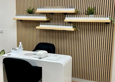 Chic nail station at Kindred Hair & Beauty, Brighton And Hove, England, GB with sleek design and product shelves.