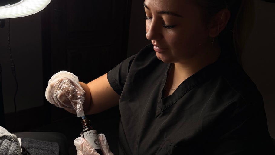 Technician applying serum at The Clean Girl Clinic in Cleethorpes, England, GB for a skincare treatment.