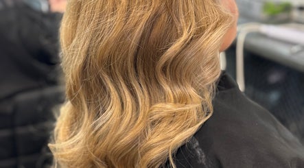 Styled blonde waves at SAMBELLEZAHAIR, Penrith, New South Wales, AU, showcasing expert styling craftsmanship.