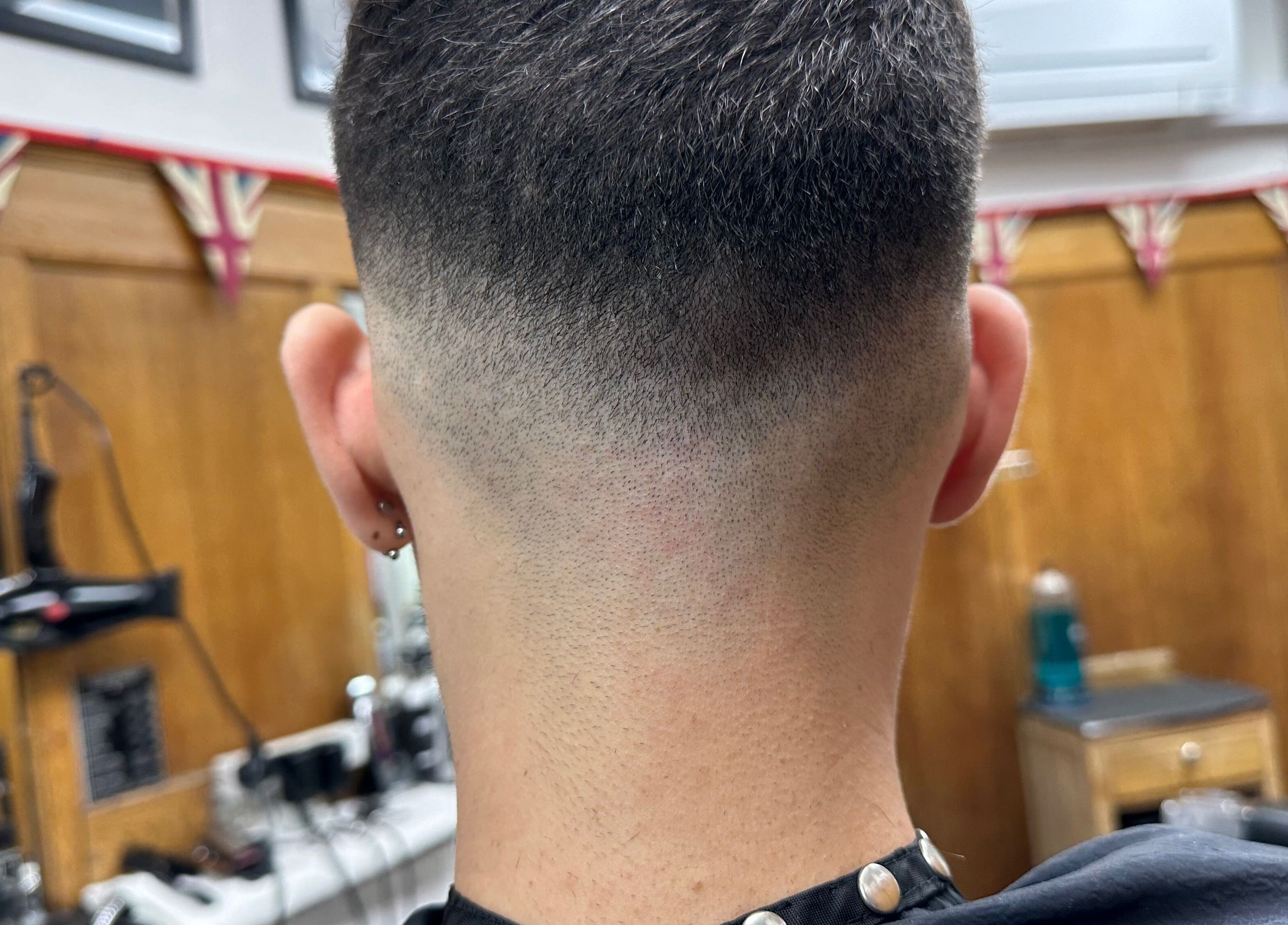 Close-up of a precise fade haircut at Barber by Naz in London, England, GB.