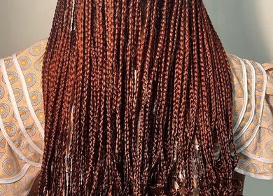 Detailed view of crimson braids at LNK Beauty Salon, Windhoek, Khomas Region, NA.