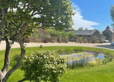 Scenic view of The Sanctuary at Upper Farm with lush greenery in Tiffield, England, GB.