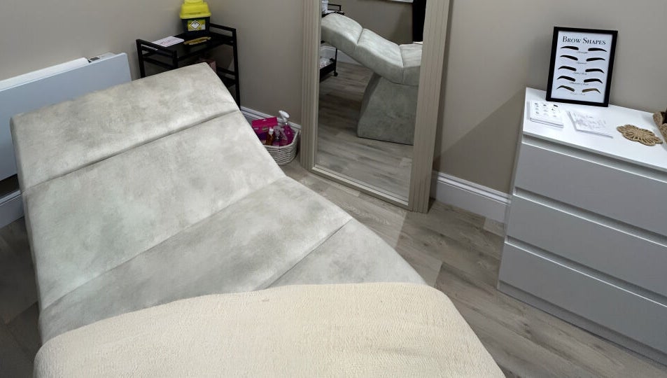 Cozy treatment room at keishalilly aesthetics, Gainsborough, England, GB with a plush bed and soothing decor.