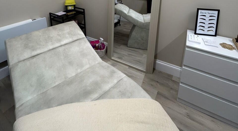 Cozy treatment room at keishalilly aesthetics, Gainsborough, England, GB with a plush bed and soothing decor.