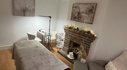 Relaxing treatment room at Hollie’s Beauty Room, Eastbourne, England, GB with inviting ambiance and elegant decor.