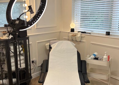 Peaceful treatment room at NAOaesthetics in Ryton, England, GB, showcasing modern equipment and serene ambiance.