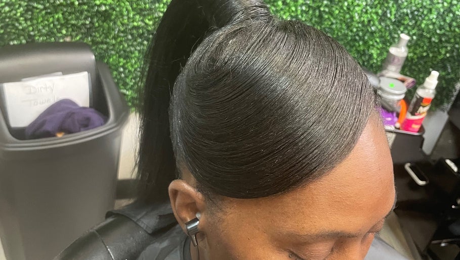 Sleek hairstyle at Just Breathe in Atlanta, Georgia, US showcases expert salon care.