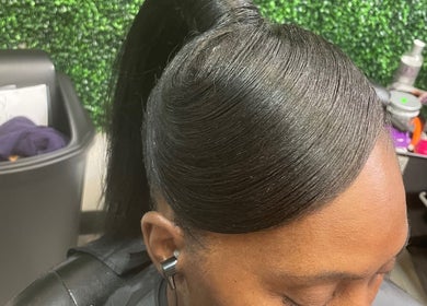 Sleek hairstyle at Just Breathe in Atlanta, Georgia, US showcases expert salon care.