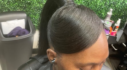 Sleek hairstyle at Just Breathe in Atlanta, Georgia, US showcases expert salon care.